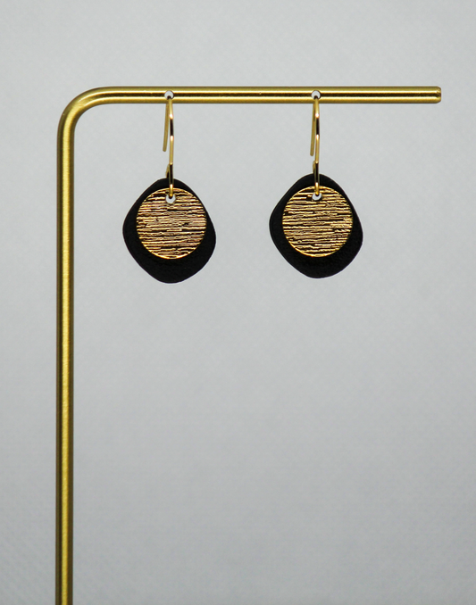 Black Clay With Gold Circle